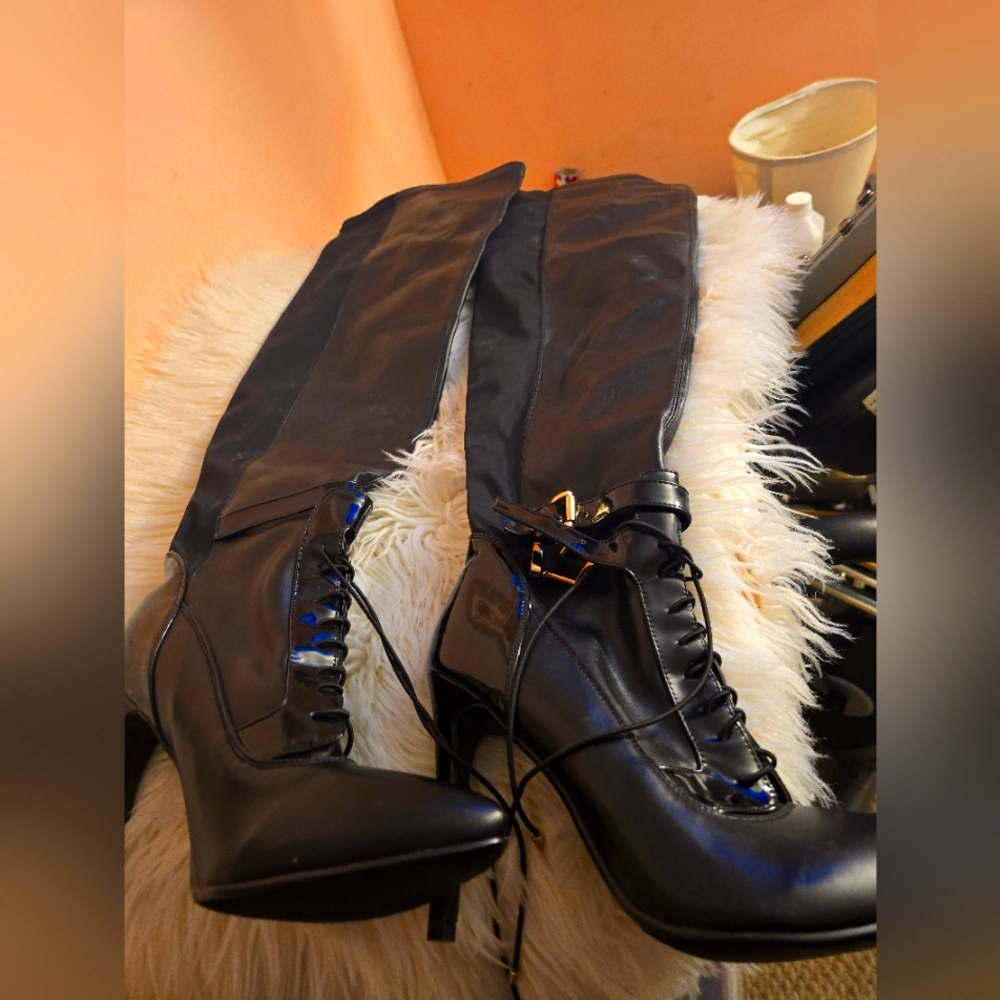 Sexy stiletto heels  over the knee black lace-up boots.